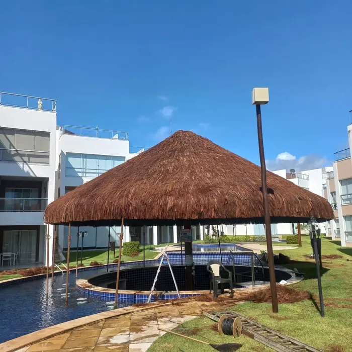 Quiosque com pente de piaçava